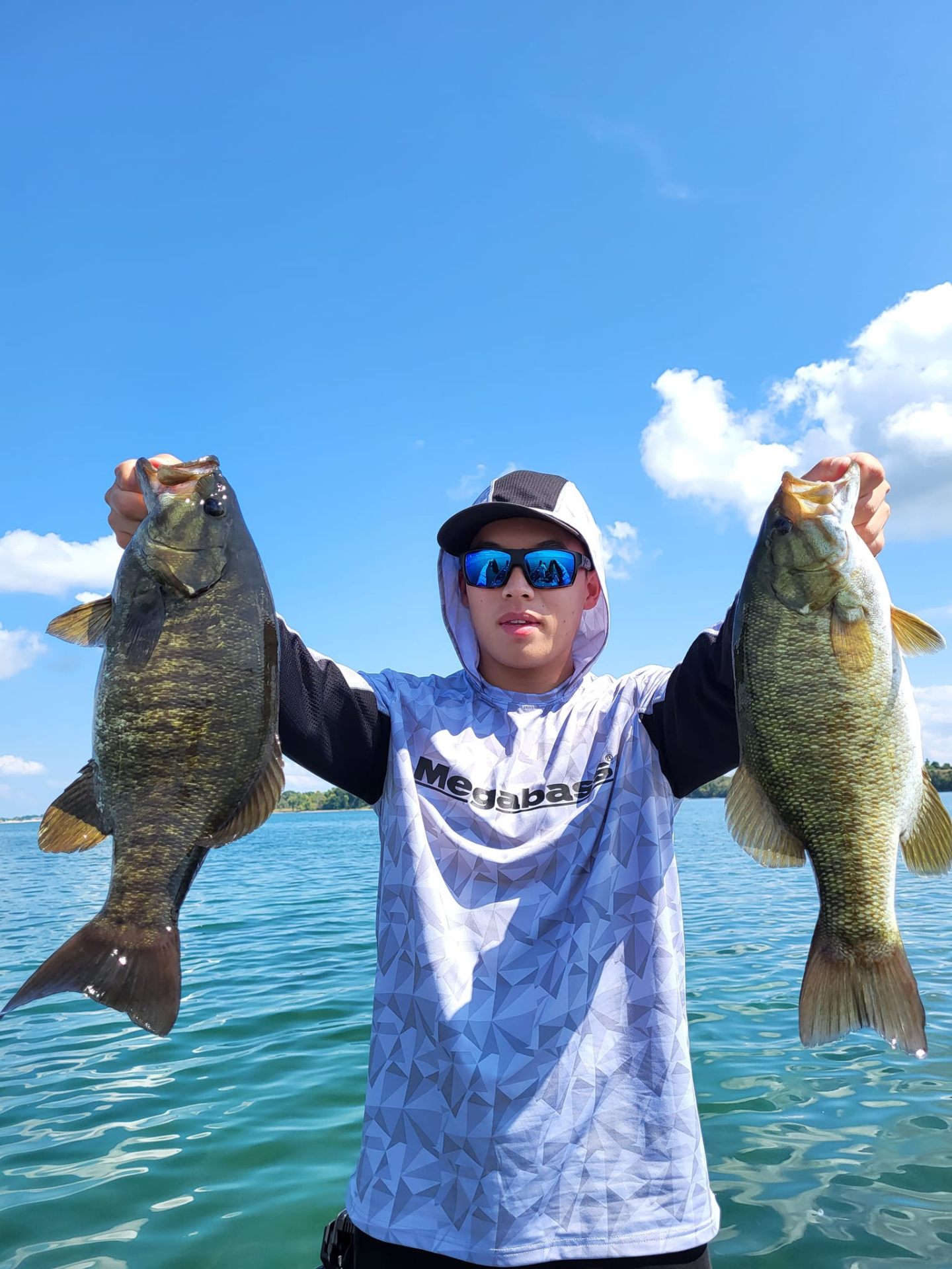 Double smallmouth bass catch on Lake Ontario